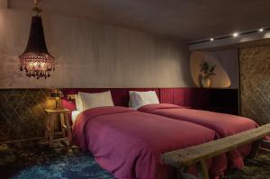 Postel nebo postele na pokoji v ubytování Unique Boutique Hotel Antibes Juan-les-Pins