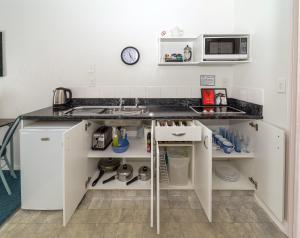 Kuchyň nebo kuchyňský kout v ubytování Palm Court Motor Inn + 8 fotografií