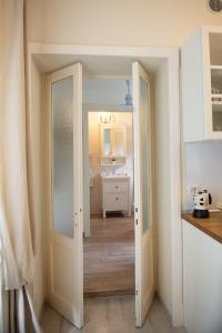 A bed or beds in a room at Appartamento "Bella vista" sul Lago di Como