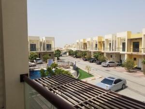 a view of a street from a balcony of a building at Romantic Hideaway, 1-BHK Villa in Dubai