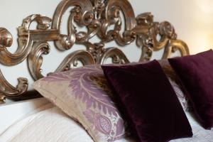 A bed or beds in a room at Appartamento "Bella vista" sul Lago di Como