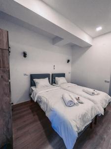Letto o letti in una camera di Apple cozy hotel