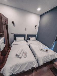 Letto o letti in una camera di Apple cozy hotel