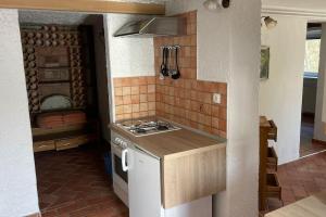 Kuchyň nebo kuchyňský kout v ubytování Family House Simba