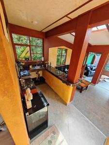 an overhead view of a kitchen in a house at Casa al lado del Bosque in Oxapampa