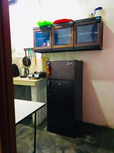 Kuchyň nebo kuchyňský kout v ubytování Green jade Inn Mirissa