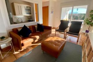 a living room with a couch and two chairs at Villa Alegre - 2 bed villa with private heated pool on Mar Menor Golf - family friendly in Torre-Pacheco