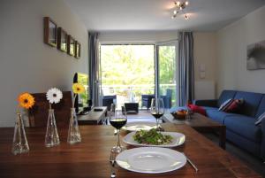 Posezení v ubytování Ferienwohnung Blaubärstrand