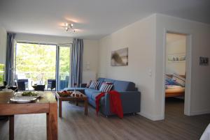 Posezení v ubytování Ferienwohnung Blaubärstrand