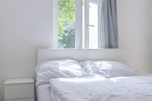 Astonishing 1BR Apt Easy Use Design/Near Schönbrunn客房内的一张或多张床位