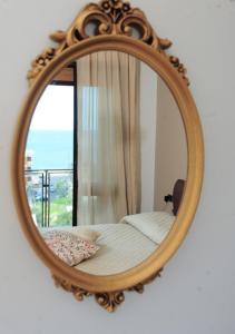 Кровать или кровати в номере Venere B&B