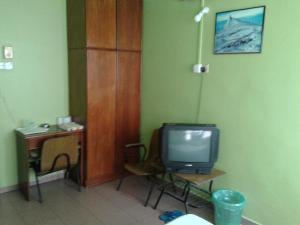 TV a/nebo společenská místnost v ubytování HotelMalaya