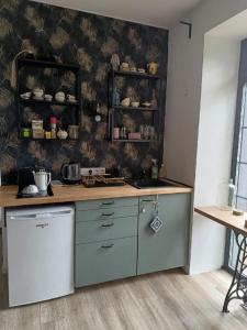 Kuchyňa alebo kuchynka v ubytovaní Apartmány Oxota