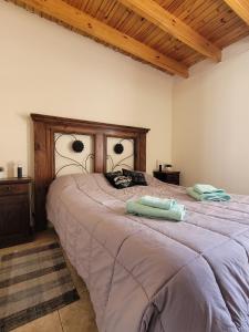 מיטה או מיטות בחדר ב-Alma Fuerte.
