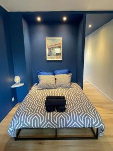 Postel nebo postele na pokoji v ubytování L'Open d'Australie