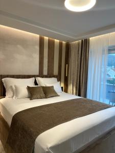 Postel nebo postele na pokoji v ubytování Luxury Rooms Andrea