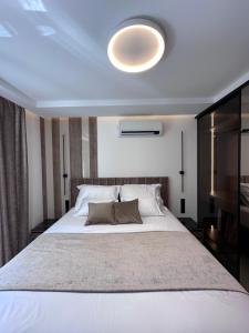 Postel nebo postele na pokoji v ubytování Luxury Rooms Andrea