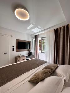 Postel nebo postele na pokoji v ubytování Luxury Rooms Andrea