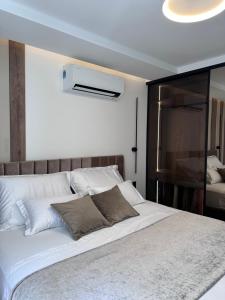 Postel nebo postele na pokoji v ubytování Luxury Rooms Andrea