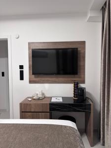 TV a/nebo společenská místnost v ubytování Luxury Rooms Andrea