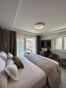Postel nebo postele na pokoji v ubytování Luxury Rooms Andrea