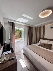 Postel nebo postele na pokoji v ubytování Luxury Rooms Andrea