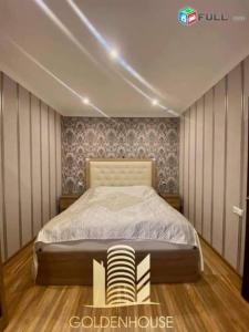 a bedroom with a bed and a table in it at Luxury apartement in Jermuk in Jermuk
