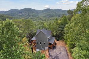 an aerial view of a house in the woods at Chasing the Son Cabin cabin in Sevierville