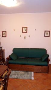 A seating area at Apartment San Pancrazio