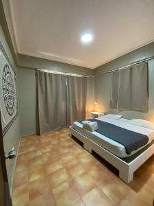 Tempat tidur dalam kamar di Bavaro Green