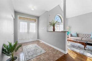 a living room with a couch and a window at The house in Ottawa