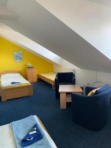 Postel nebo postele na pokoji v ubytování hotel Sádek
