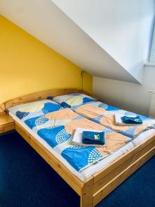 Postel nebo postele na pokoji v ubytování hotel Sádek
