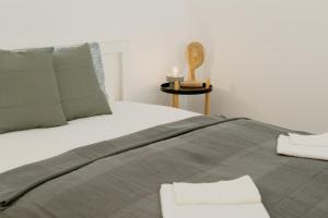 Postel nebo postele na pokoji v ubytování BALANCE apartments