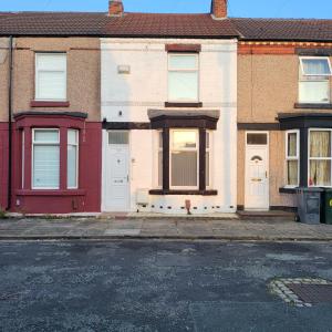 an empty street in front of a house at Entire House-Merseyside-Liverpool in Birkenhead