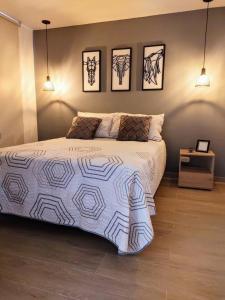 Кровать или кровати в номере Hermoso y moderno apartaestudio en el norte de la ciudad, la Flora - 602 +18 фотографий