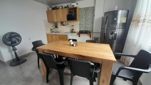 Kuchyň nebo kuchyňský kout v ubytování Apto Hogar Dulce Hogar ARBOLETES