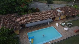 een uitzicht op een huis met een zwembad bij Casa Finca Lourdes in Venecia