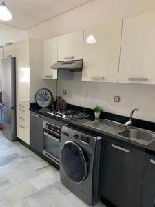 Kuchnia lub aneks kuchenny w obiekcie Appart vue sur mer,