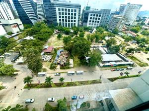 an aerial view of a parking lot in a city at Affordable Ayala Avida IT Park Condo across Ayala Mall Central Bloc Sugbu Mercado in Tabok