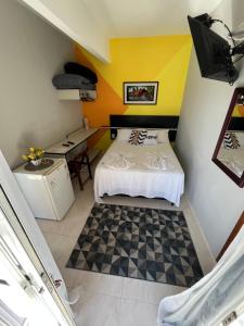 Cama ou camas em um quarto em Pousada Antares