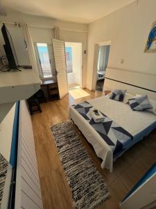 Cama ou camas em um quarto em Pousada Antares
