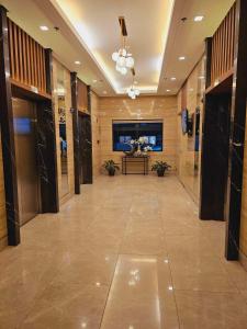 Lobby o reception area sa SM Spring Residences Tower 2 Condominium Bicutan Parañaque Cozy Condo