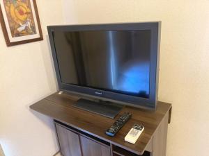 A television and/or entertainment centre at Nishimoto Building - Vacation STAY 16015v