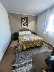 Cama ou camas em um quarto em Pousada Antares