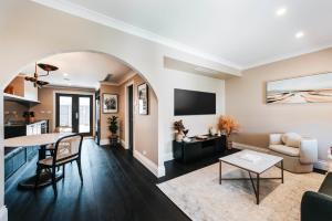 an open living room with a table and a living room at McKenna Terraces in Mudgee