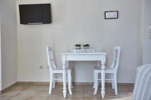 TV a/nebo společenská místnost v ubytování Aelia