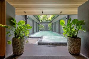 Giường trong phòng chung tại La Siesta Classic Hang Thung