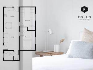 a floor plan of a bedroom with a bed at No 6 ShoalHaven in Shoal Bay