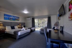 Postel nebo postele na pokoji v ubytování Frankston Motel + 37 fotografií